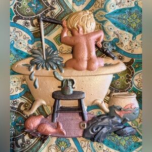 Vintage Sexton cast aluminum wall plaque from the 1970s